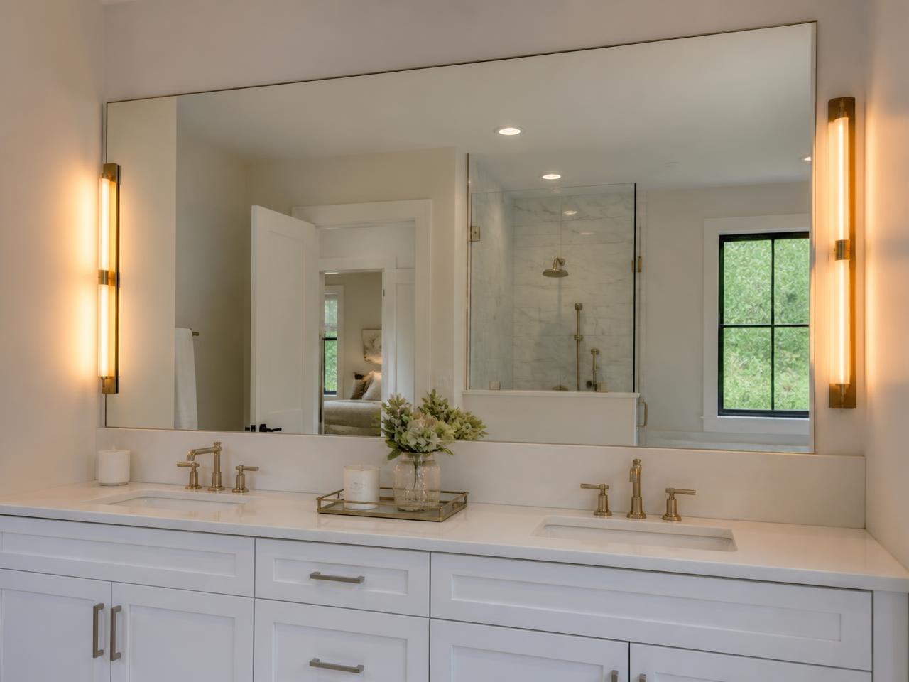 Custom frameless vanity mirror cut to size and installed by LUNA Glass Pro